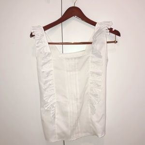 white ruffle sleeveless top
